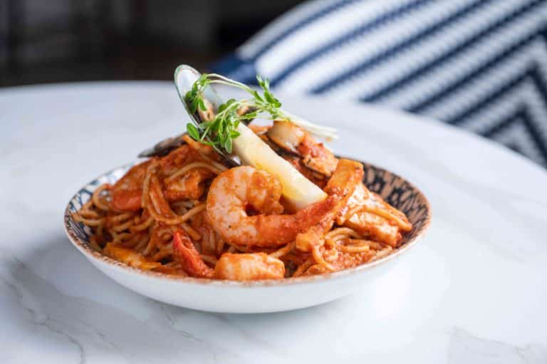 Pasta dish with prawns and sauce
